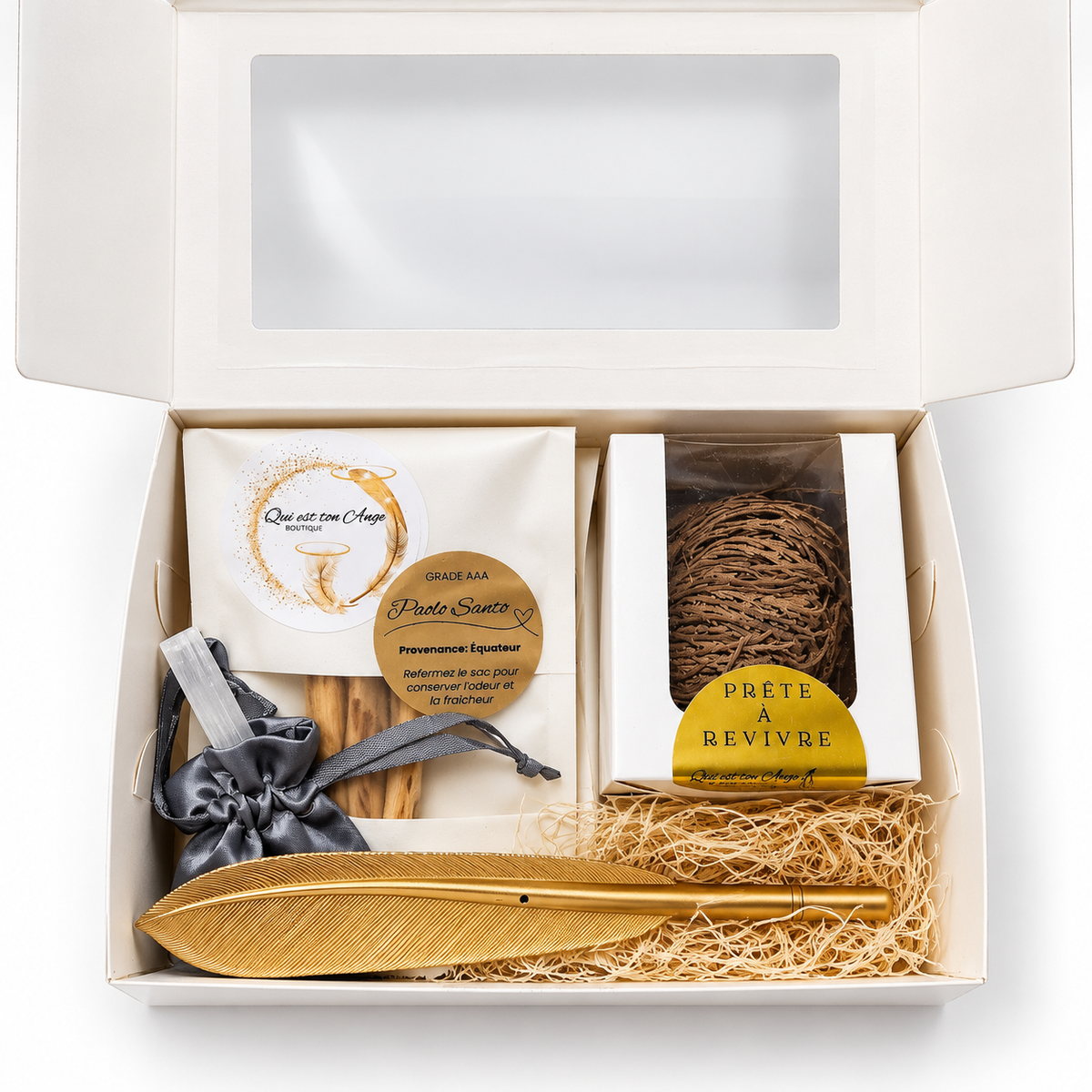 Coffret spirituel ouvert avec ses produits disposés dans la boîte.