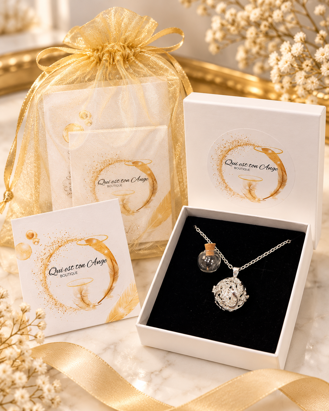 Présentation cadeau du coffret à composer à 50 $ — le pendentif est choisi dans les options.